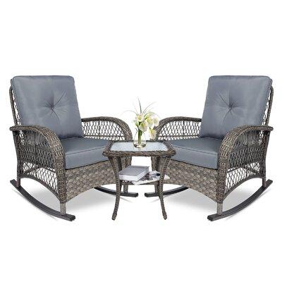 Bayou Breeze 3 Pieces Outdoor Wicker Rocking Chair Set, Rattan Patio Rocker Chairs Set w/ Cushions & Glass-top Coffee Table | Wayfair