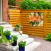 Lark Manor™ Anuschka Sheila Golden "Tiger Lilies" Outdoor All-Weather Wall Decor All-Weather Canvas, Wood | 14 H x 14 W x 14 D in | Wayfair