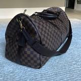 Louis Vuitton Bags | Louis Vuitton Keepall Bandoulire 55 Duffle Bag | Color: Brown | Size: 21.7 X 12.2 X 9.4 Inches