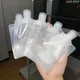 Sac d'emballage à clapet 10 pièces 30/50/100ml poudres à bec plastique désinfectant pour les