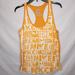 Nike Tops | Nike Loose Fit Women's Orange Graphic All Over Print Tank Top Large | Color: Orange/White | Size: L