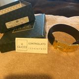 Gucci Jewelry | Gucci Black Lizard Bracelet With Gold Buckle | Color: Black/Gold | Size: Adjustable Two Sizes