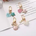 Porte-Clés Mignon en Perles Imitées en Forme de Cœur Étoile de Mer Pendentif en Coquille D.lique