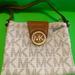 Michael Kors Bags | Authentic Michael Kors White Brown Gold Small Multi-Pocket Crossbody Bag Purse | Color: Tan | Size: Small