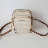 Michael Kors Bags | Michael Kors Jet Set Travel Medium Ns Chain Crossbody Mk Logo Vanilla | Color: Brown/White | Size: Small To Medium