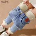 Jeans chauds taille moyenne pour femmes pantalons en denim pour femmes bleu longueur de rinçage