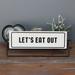Trinx Let's Eat Out/Let's Stay Home Rotating Tabletop Sign Wood in Black/Brown/White | 4.5 H x 13.25 W x 3.5 D in | Wayfair