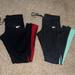 Nike Pants & Jumpsuits | 2 Pair Nike Athletic Leggings Red Black Grey Teal Large | Color: Black/Gray | Size: L