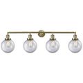 Beacon 4 Light 44" Bath Light - Antique Brass - Clear Shade