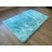 Blue 66 x 42 x 3 in Area Rug - Everly Quinn Mar Vista Solid Color Machine Woven Faux Sheepskin Area Rug in Sheepskin/Faux Fur | Wayfair