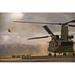 US Army CH-47 Chinook helicopters depart a military base in Afghanistan Poster Print by Stocktrek Images (17 x 11)