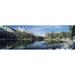 Panoramic Images PPI45090L Reflection of trees in a lake Yellowstone National Park Wyoming USA Poster Print by Panoramic Images - 36 x 12