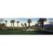 Palm trees in a golf course Desert Springs Golf Course Palm Springs Riverside County California USA Poster Print by - 36 x 12