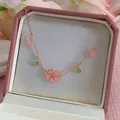 Collier exquis de fleurs de cerisier pour femmes Zircon cristal Rose cœur papillon clavicule