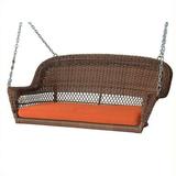 Pemberly Row Honey Wicker Porch Swing with Orange Cushion