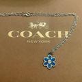 Coach Jewelry | Coach Blue Enamel Signature Flower Pendant .925 Sterling Silver Necklace | Color: Blue/Silver | Size: Measures 18”-20” In Length
