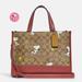 Coach Bags | Coach X Peanuts Dempsey Carryall With Snoopy Woodstock Print | Color: Brown | Size: 11 1/2" (L) X 8 3/4" (H) X 5" (W)