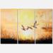 Designart Three Cranes Flying Through Warm Sunset Traditional Canvas Wall Art Print