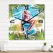 Designart 'Beautiful Blond Model At The Beach Sunbathing' Nautical & Coastal Wall Clock Decor