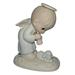 Precious Moments Figurine: PM841 God s Ray of Mercy (4.7 )