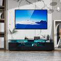 Ivy Bronx Carvey TV Stand for TVs up to 78" TV Cabinet w/ LED Light Wood in Black | 20 H x 77 W x 17 D in | Wayfair