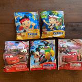 Disney Games | **5** Nwt Disney Puzzles Cars Mickey Mouse Jake | Color: Blue/Yellow | Size: Os
