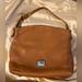 Dooney & Bourke Bags | Dooney & Bourke Bag Color Brown, W/ Dust Bag. Size 11x14x4. Gently Used. | Color: Brown | Size: Medium 11x14x4