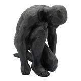 Benjara 16 Polyresin Kneeling Man Statue with Rustic Accents Black