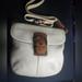 Coach Bags | Coach Soho Pebbled Leather Swingpack White/Saddle | Color: Brown/White | Size: Os