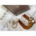 Gucci Accessories | Gucci Alphabet Letter “U” Wooden & Crystal Bag Charm/Keychain | Color: Brown/Silver | Size: Os