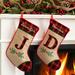 The Holiday Aisle® Christmas Personalized M Letter Stocking Cotton/Burlap/Jute in Brown/Green/Red | 10 H x 16 W in | Wayfair