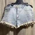 Free People Shorts | Light Blue Denim Shorts With White Lace Design | Color: Blue/White | Size: W 31