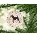 The Holiday Aisle® Airedale Terrier Merry Christmas Hanging Figurine Ornament Ceramic/Porcelain in Black/Brown | 2.8 H x 2.8 W x 0.15 D in | Wayfair
