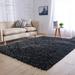 Black 85 x 60 x 1 in Indoor Area Rug - Everly Quinn Rectangle Solid Color Handmade Tufted 5' x 7'1" Polyester Area Rug in Polyester | Wayfair