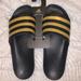 Adidas Shoes | Adidas Unisex Slides | Color: Black/Gold | Size: Men 12 Women 13