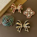 Broche en émail rétro avec nœud papillon pour femme épingles élégantes épingle à nœud perle