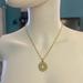 Coach Jewelry | Coach Hammered Gold Donut Pendant 18k/.925 Sterling Silver Necklace | Color: Gold | Size: 18” In Length