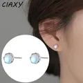 CIAXY – boucles d'oreilles couleur argent en pierre de lune pour femmes Mini boucles d'oreilles à