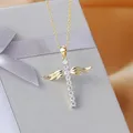 Collier avec pendentif en forme d'ailes d'ange pour femme accessoire de cou en forme de croix mode