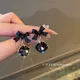 Boucles d'oreilles noires en forme de nœud pour femme bijou mystique carré idéal pour un cadeau