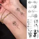 Tatouage autocollant temporaire imperméable à l'eau pour enfant faux tatouage motif de fleur Rose