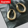 Boucles d'oreilles ovales solides Bergame pour femmes boucle plaquée or 18 carats cerceau en acier