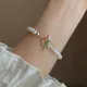 Bracelet de luxe français en forme de fleur de tulipe pour femmes Imitation coréenne perle pêche