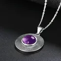 Collier pendentif rond en argent regardé pour femme pierre précieuse naturelle faite à la main