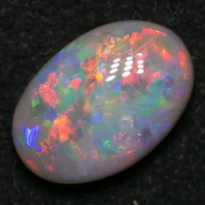 Cabochon d'opale narblanche naturelle magnifique pierre précieuse Ethiopienne 0.65 ct 5x7mm