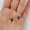 Boucles d'oreilles longues pendantes pour dames design unique pendentif oiseau pompon en cristal