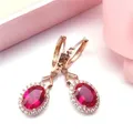 Boucles d'oreilles pendantes d'adrénaline en or violet pour femmes or rose 14 carats cristal