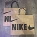 Nike Bags | New Bundle Of 2 Nike Gift Bags - Recycled Paper Gift Bag - Nike Bags | Color: Black/Brown | Size: Os