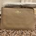 Coach Bags | Coach Side Zipper Taupe Color Wristlet New | Color: Tan | Size: Os