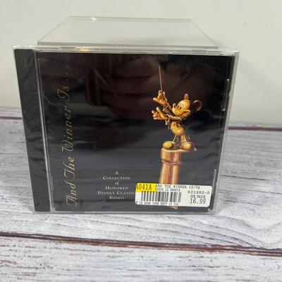 Disney Media | Disney Rare Cd And The Winner Is Collection Of Disney Classic Songs 1994 New | Color: Black | Size: Os